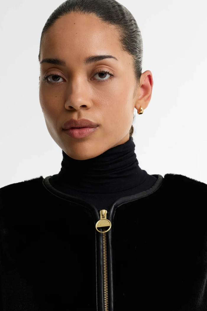 Barbour International Oulton Faux Fur Liner Black LLI0028 close up on model Shop Barbour International at Dotique