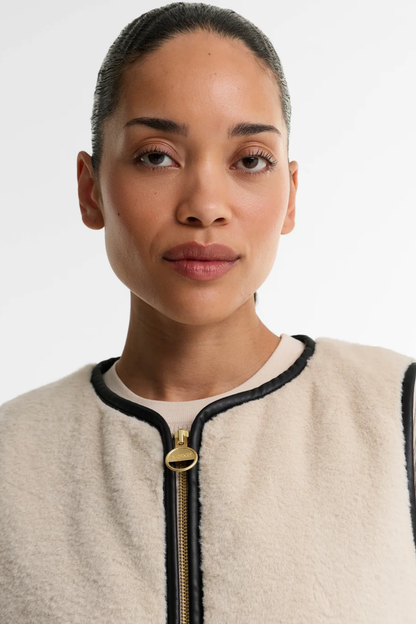 Barbour International Oulton Faux Fur Liner Lt Stone/Black LLI0028 on model Shop Barbour International at Dotique