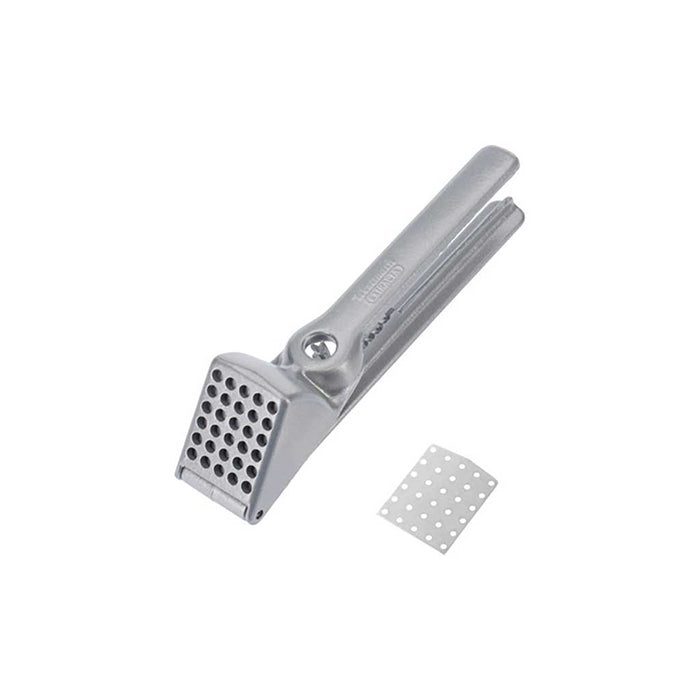 Metal garlic press on a white background