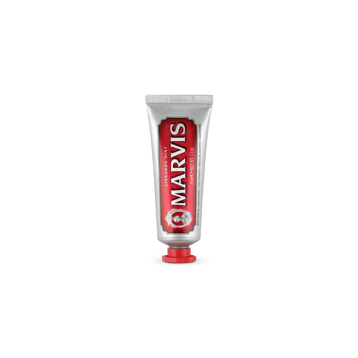 Travel-size tube of Cinnamon Mint Marvis toothpaste.