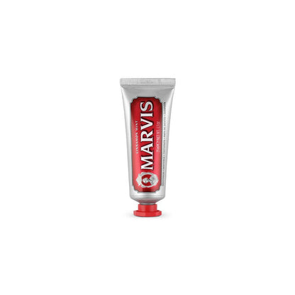 Travel-size tube of Cinnamon Mint Marvis toothpaste.