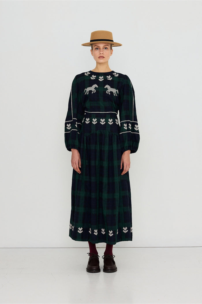 Tiny Big Sister Embroidered Check Puff Sleeves Blouse AW26-754 on model Shop Tiny Big Sister at Dotique