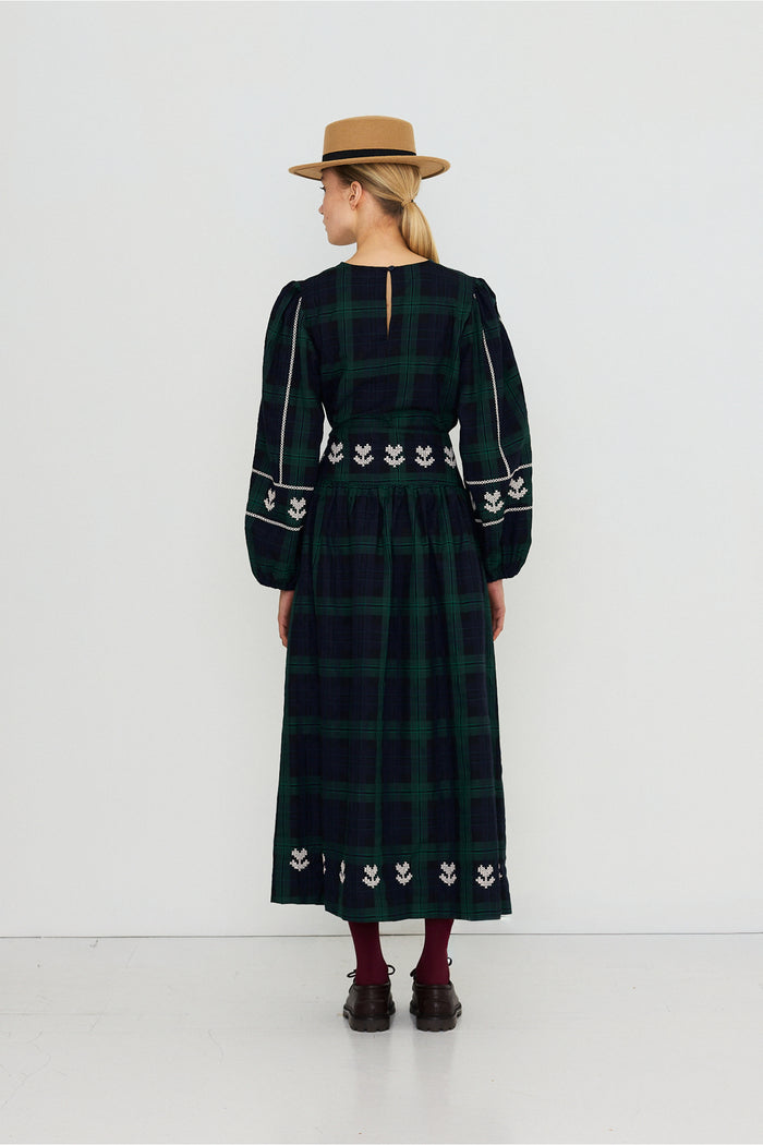 Tiny Big Sister Embroidered Check Puff Sleeves Blouse AW26-754 on model Shop Tiny Big Sister at Dotique